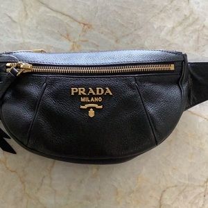 Leather Prada bag super cute. Will fit everything you need